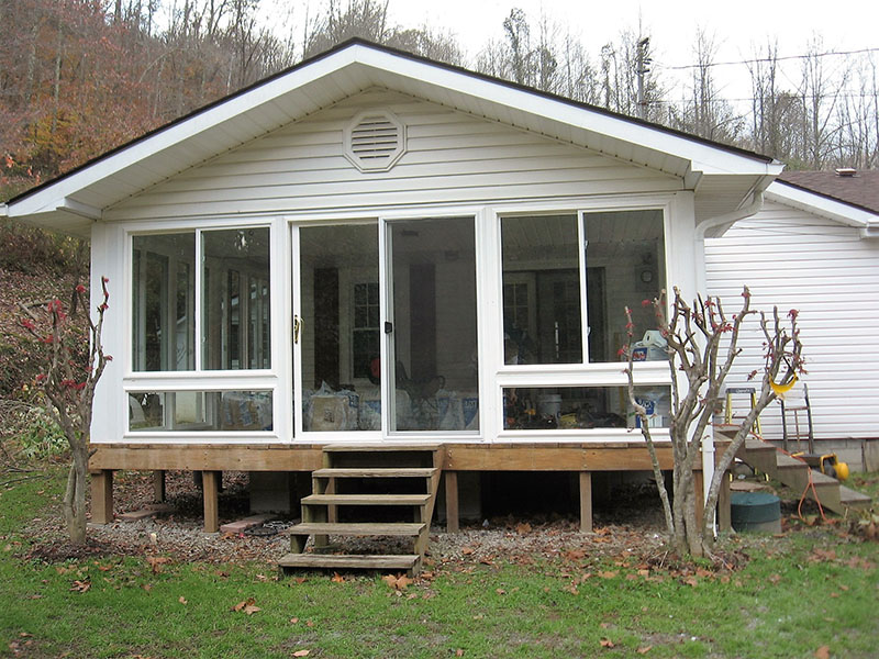 Gabled sunroom with insulated roof by ATC Sunrooms