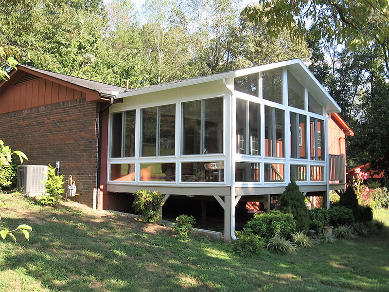 Sunroom with glass walls by ATC Sunrooms Knoxville