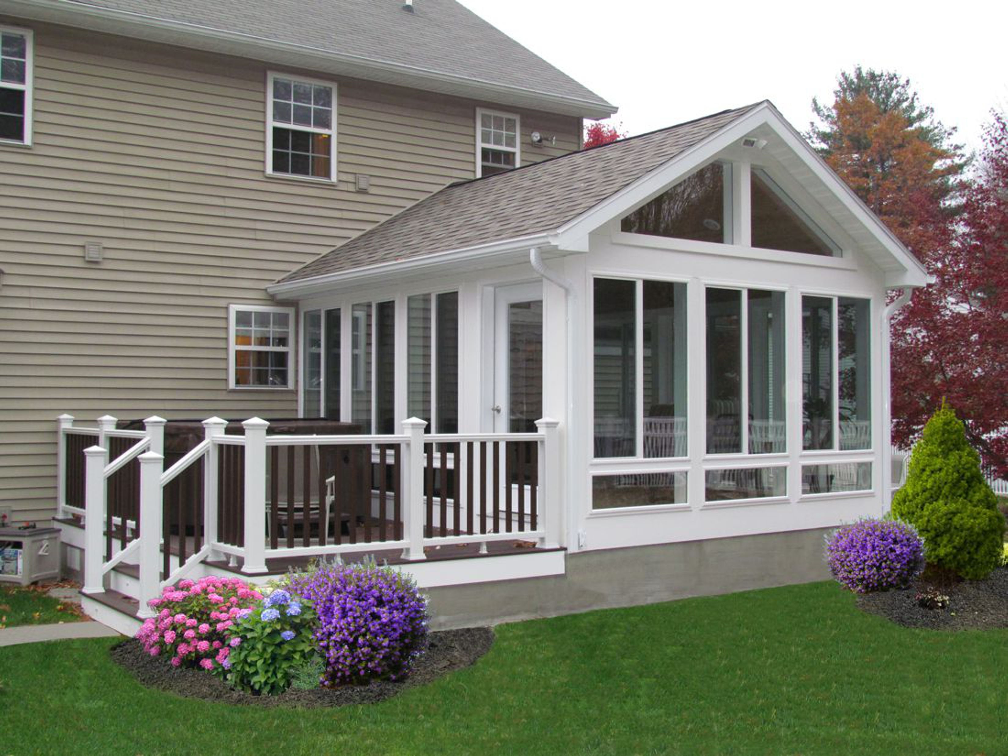 Deck and sunroom combination project by ATC Sunrooms