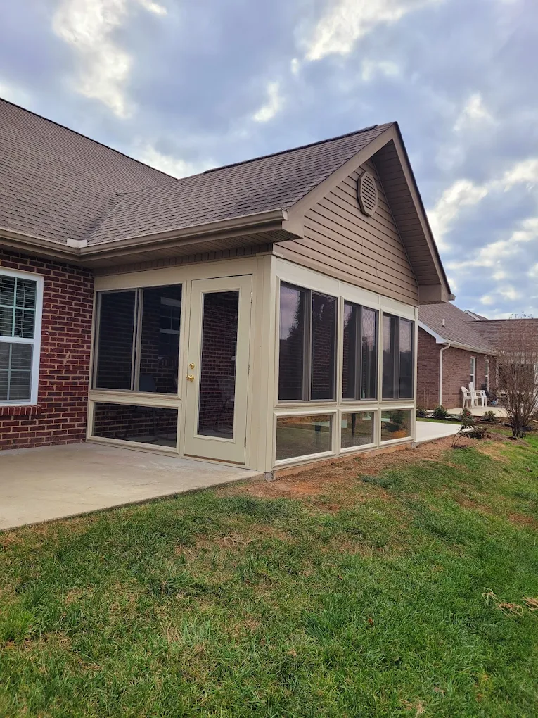 Custom gabled sunroom addition with flower boxes by ATC Sunrooms in Knoxville TN